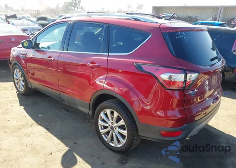 2017 Ford Escape Titanium z USA, uszkodzony, nr VIN 1FMCU9JD3HUC57516